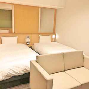 Standard Quadruple 2 single bed and 1 double bed